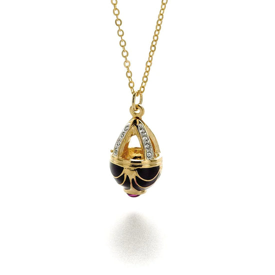 Load image into Gallery viewer, Ruby Basket Egg Pendant made of and with pewter with gold finish, clear crystals. The chain is included, spring ring closure

